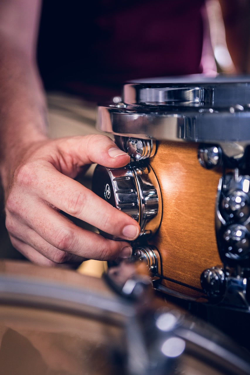 dialtune snare drum being tightened using a dial