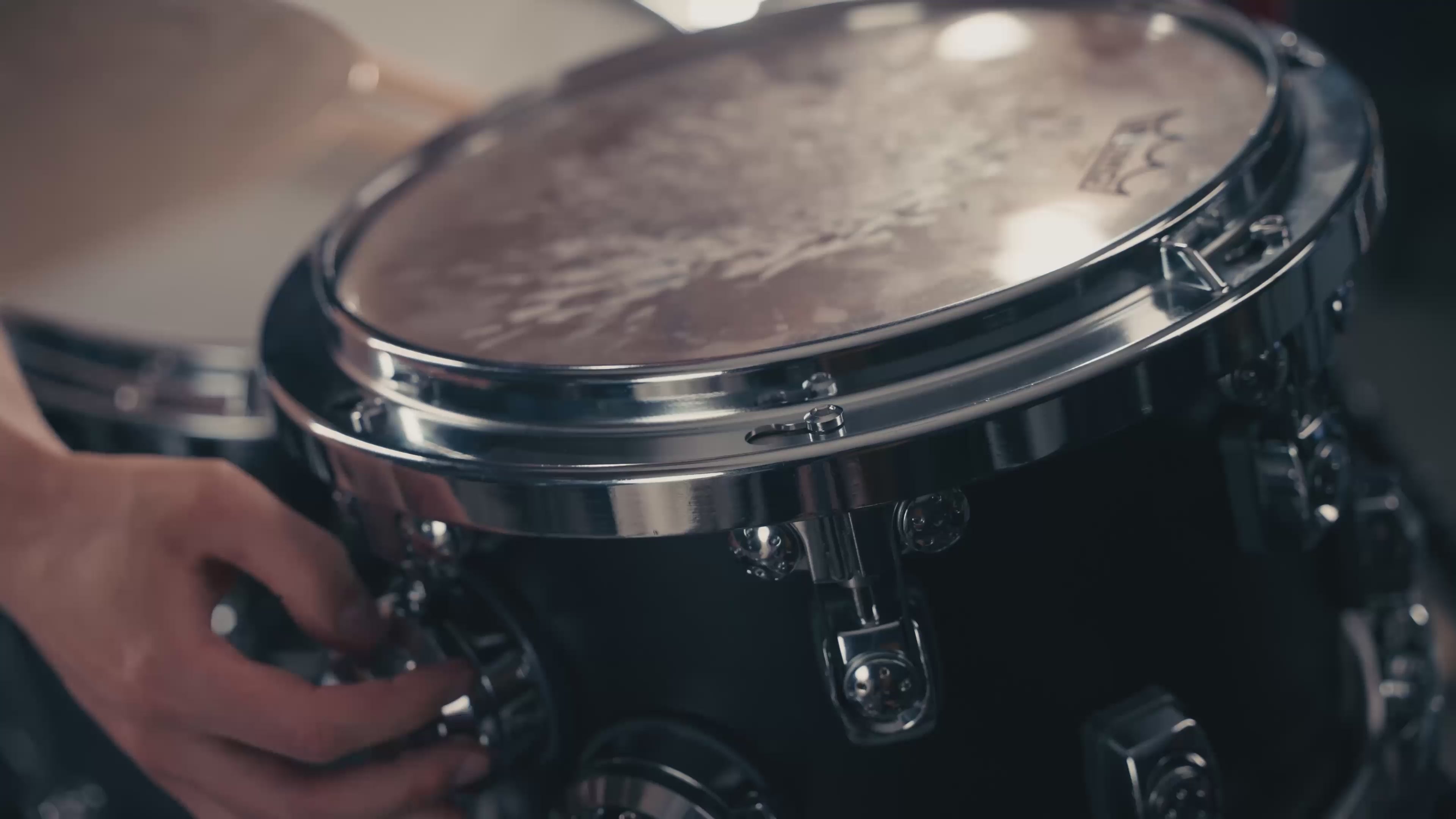 Load video: Changing a drum head on a Dialtune rack tom