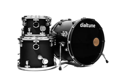 Black drum set with 'dialtune' branding on a white background