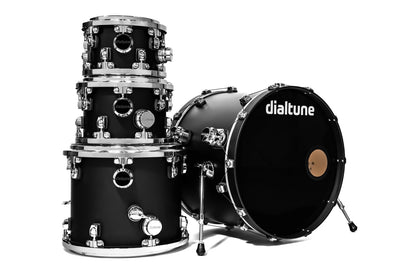 Black drum set with 'dialtune' branding on a white background