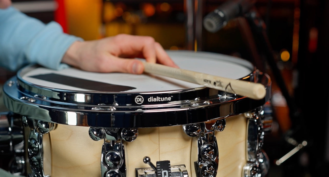 Dialtune snare drum, drummer using cross-stick on the snare drum.